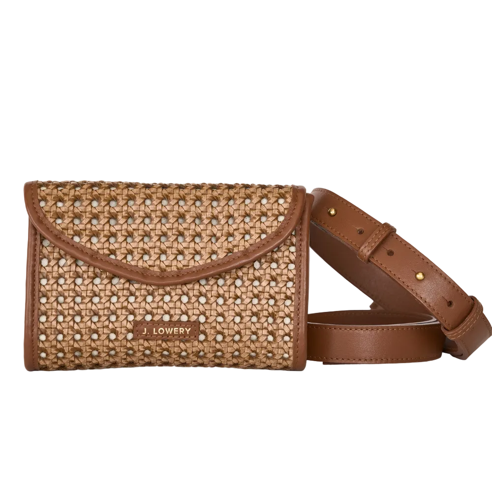 Brown woven handbag with a strap on a light gray background