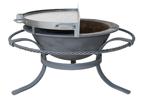 Metal fire pit with a lid on a white background