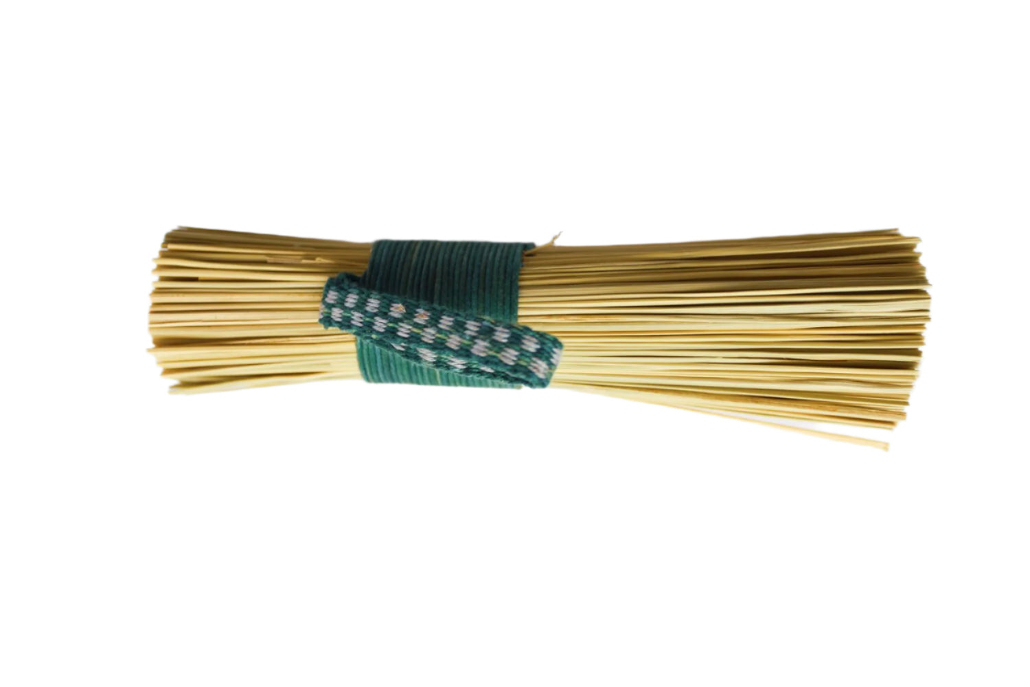 Bunch of gold-colored straws tied with a green and white striped band on a light gray background