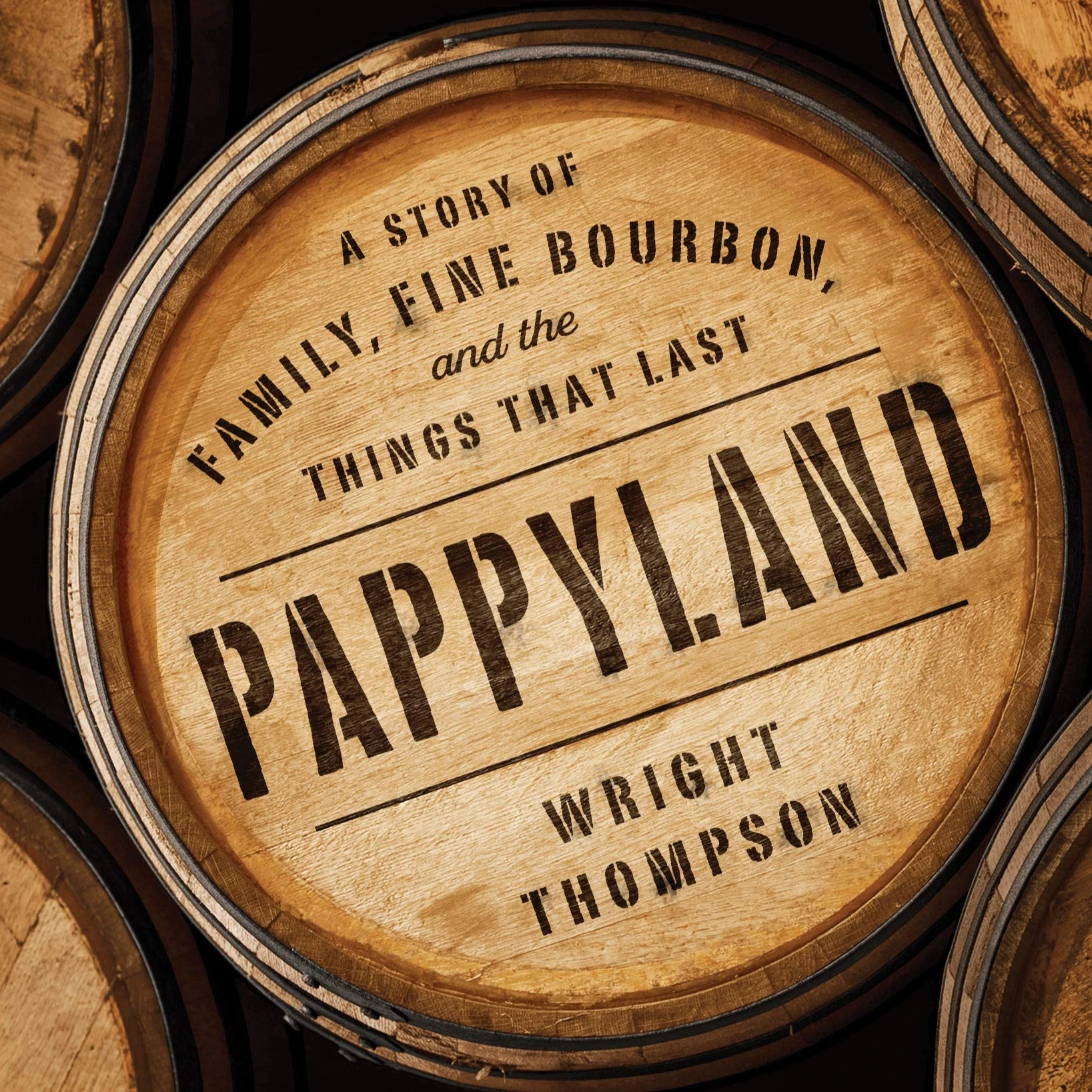 Wooden barrel with 'Pappyland' branding and text about family, fine bourbon, and lasting things.