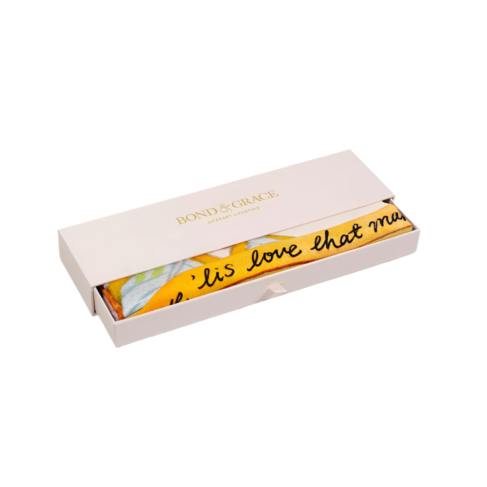 Product packaging with a yellow strip and 'love' text on a white background