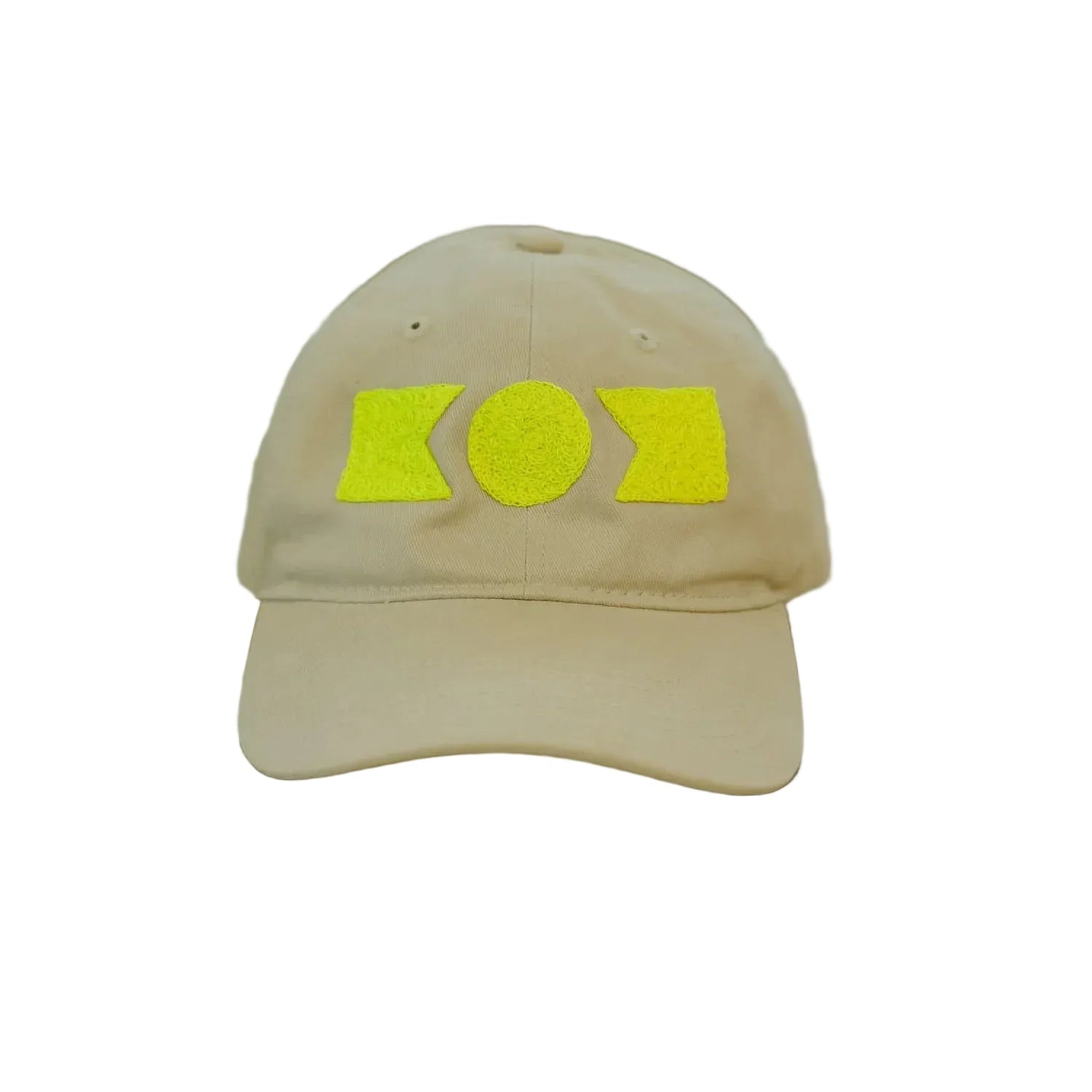 Beige cap with yellow logo on a metallic surface