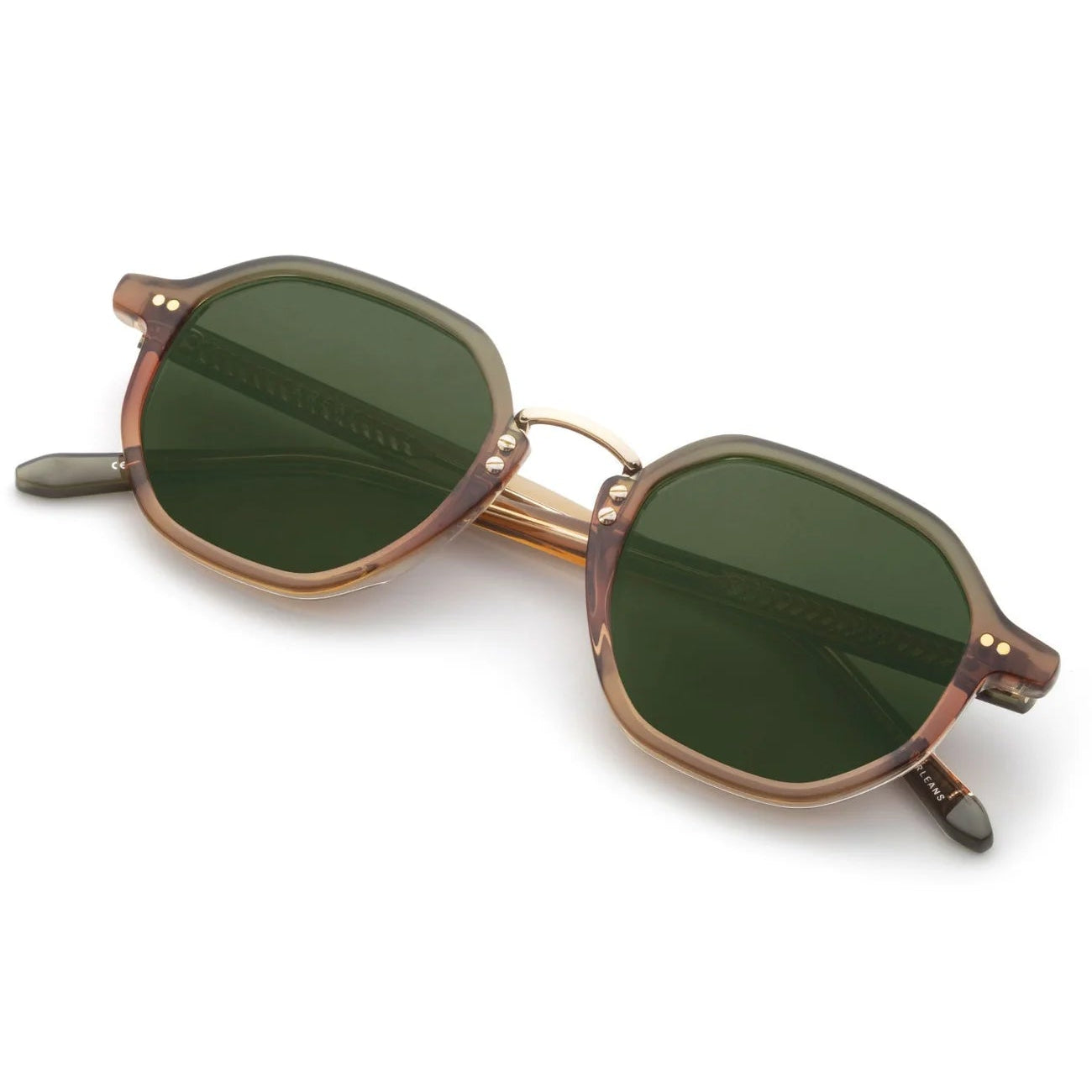 Sunglasses with bronze frame and green lenses on a white background