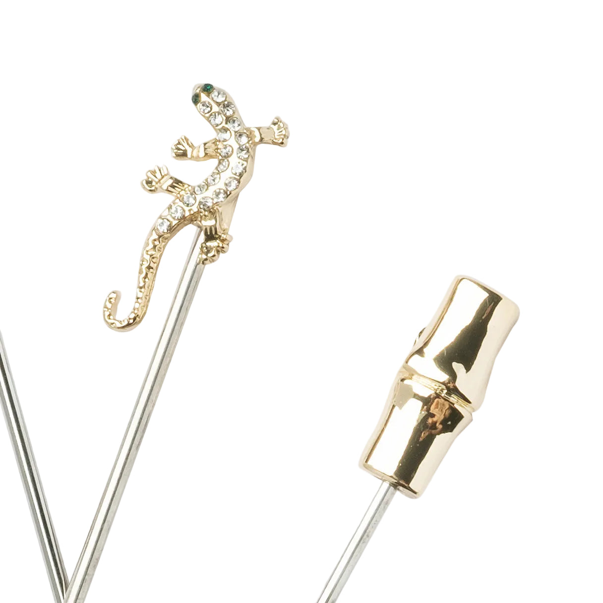 Gold lizard-shaped hairpin on a white background