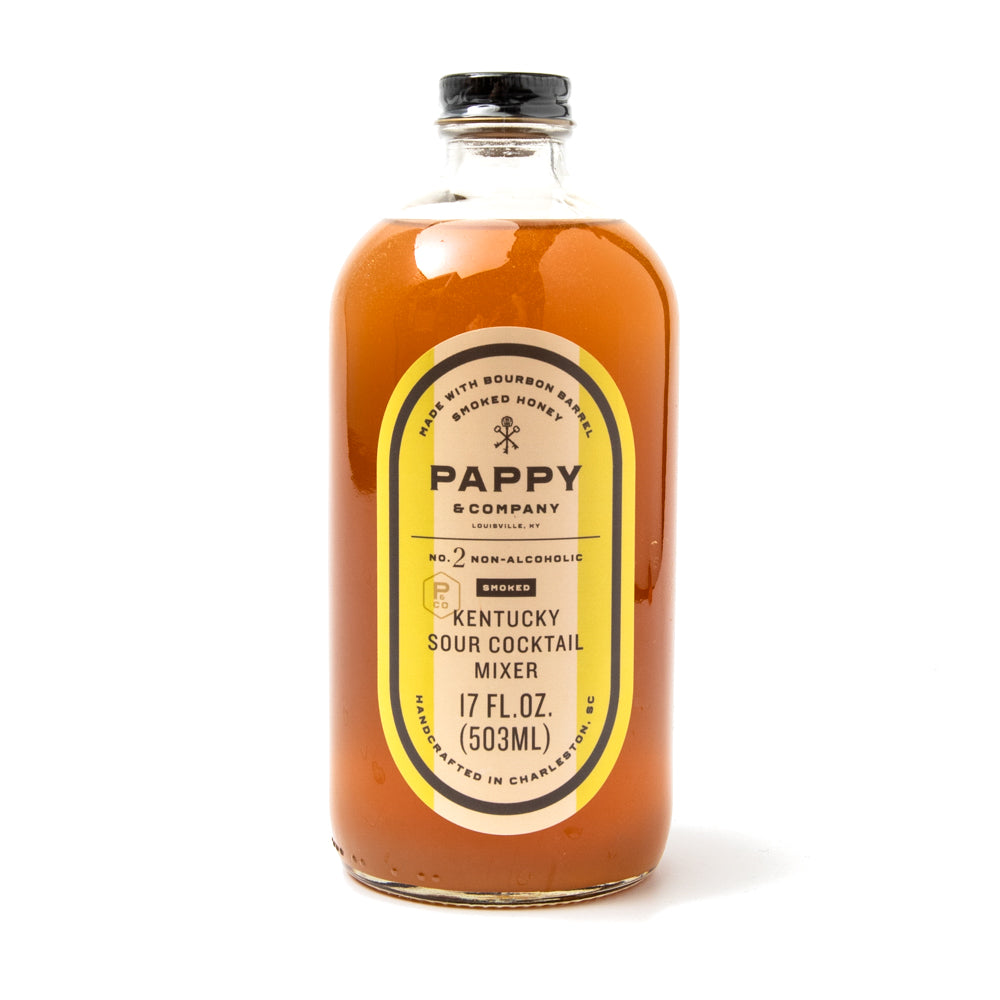 A bottle of Pappy & Company Kentucky Sour Cocktail Mixer, showing a label with the brand name, product name, and volume information.