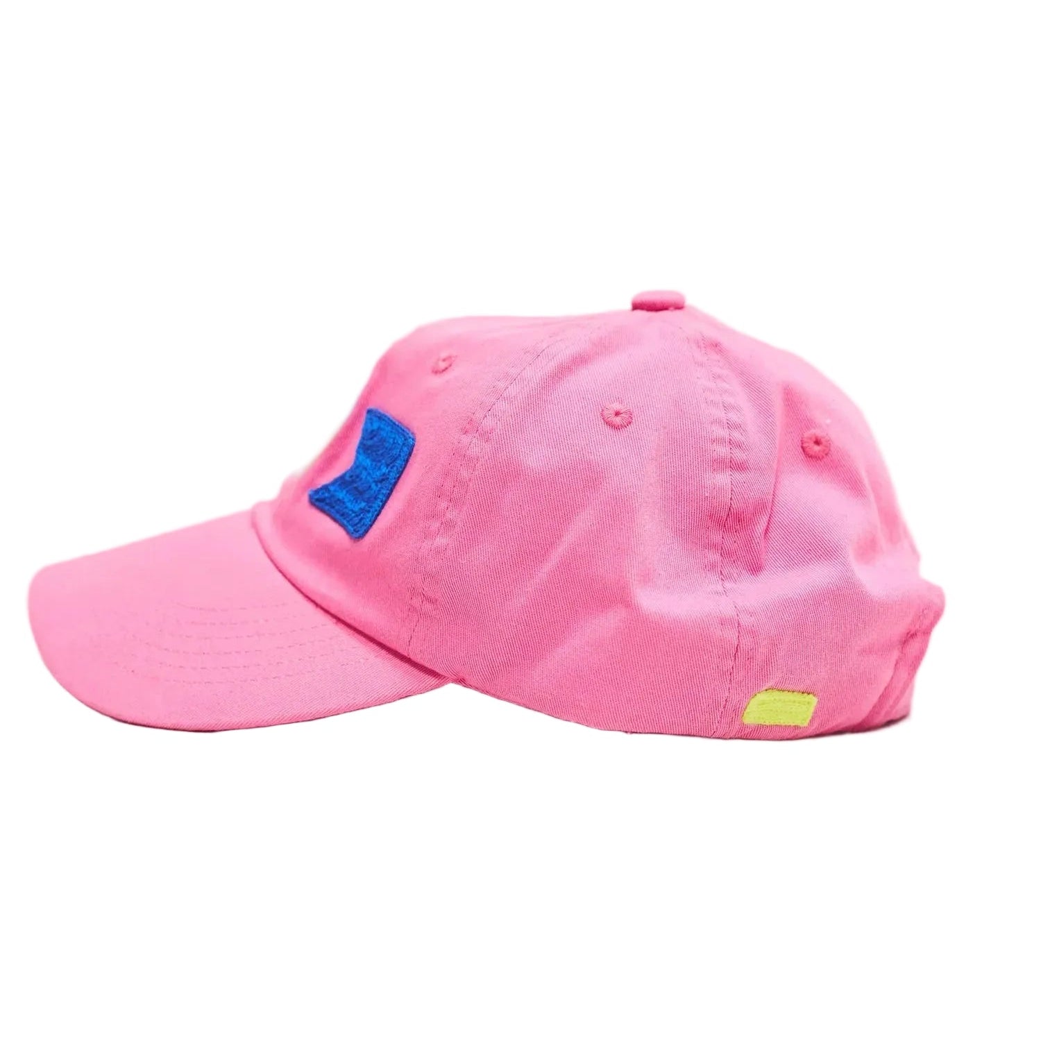 Pink cap with a blue patch on a light gray background