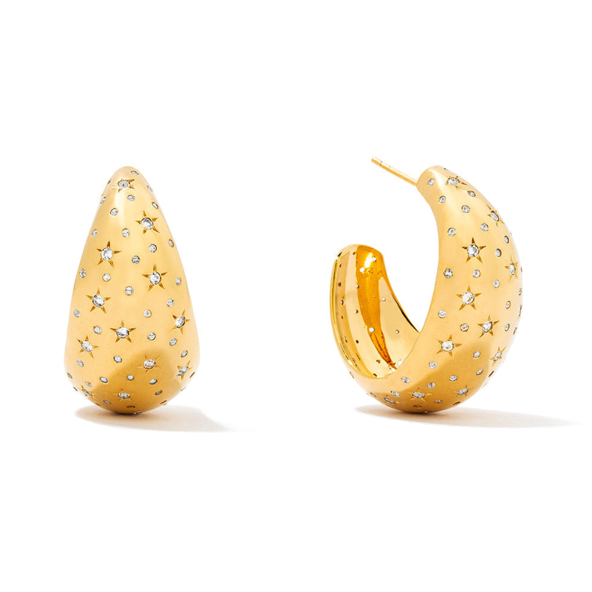 A pair of 14k gold-plated brass hoop earrings with natural white topaz stones, designed to resemble stars.