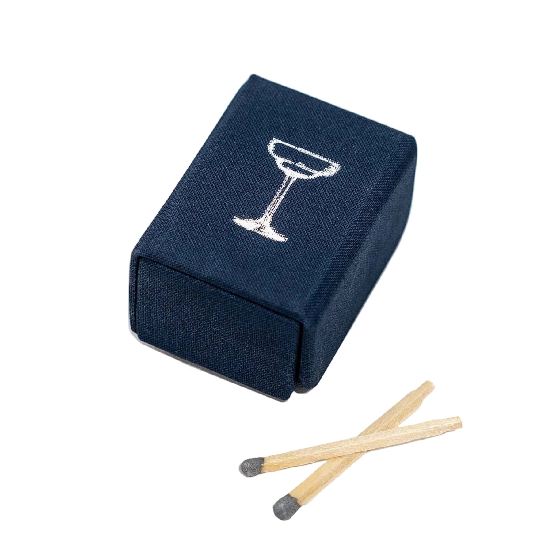 Navy blue matchbox with a martini glass design and two matches on a white background