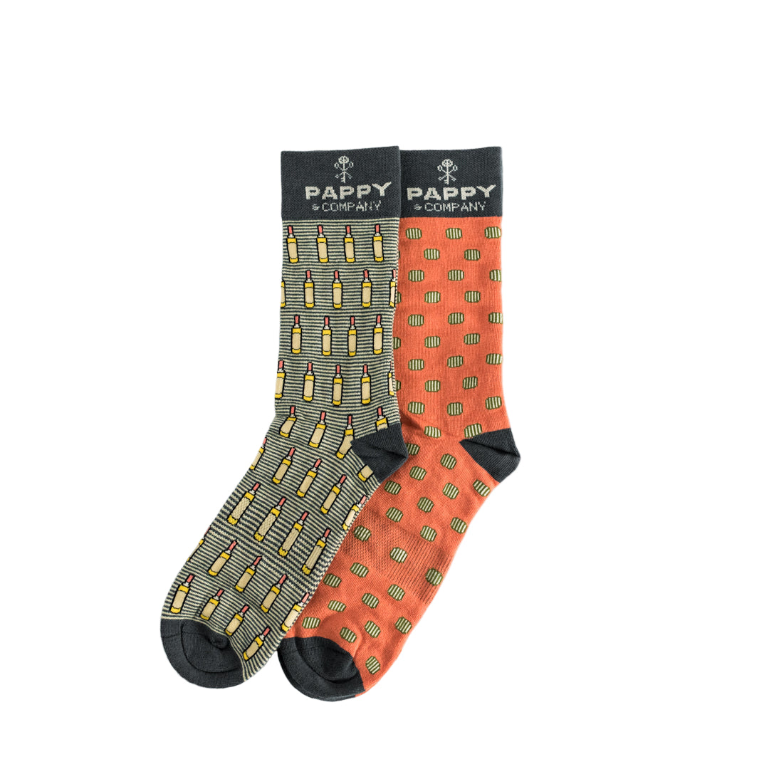 Two pairs of patterned socks with packaging labeled 'Pappy & Company' on a white background.
