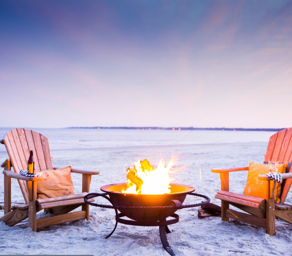 Two Adirondack chairs around a fire pit on a beach with '30-Gallon' label.
