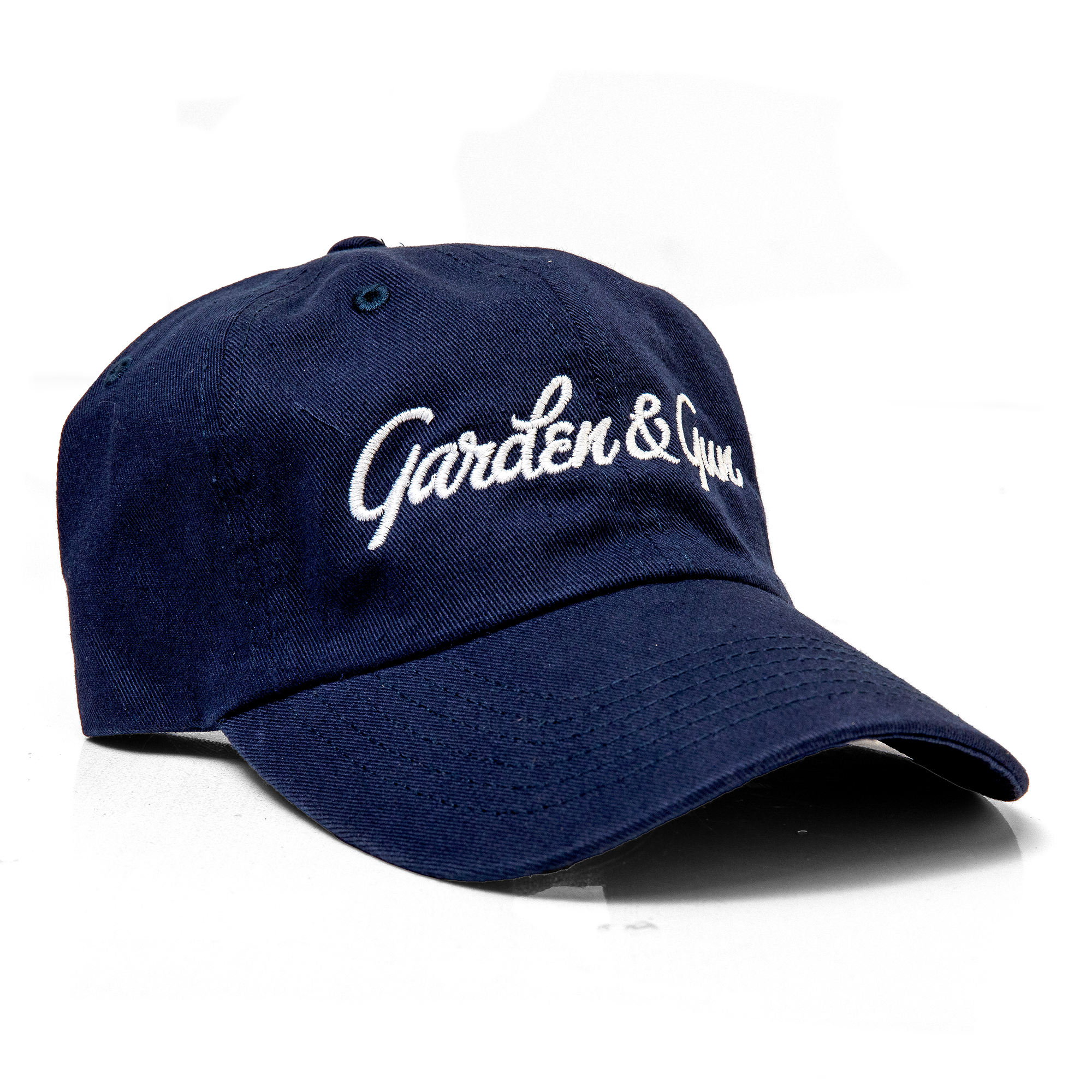 Navy blue cap with 'Garden & Gun' logo on a white background