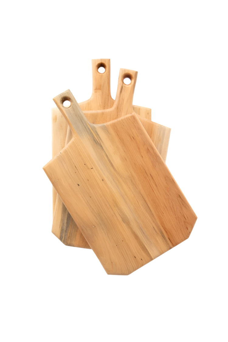 Set of wooden cutting boards with handles on a white background