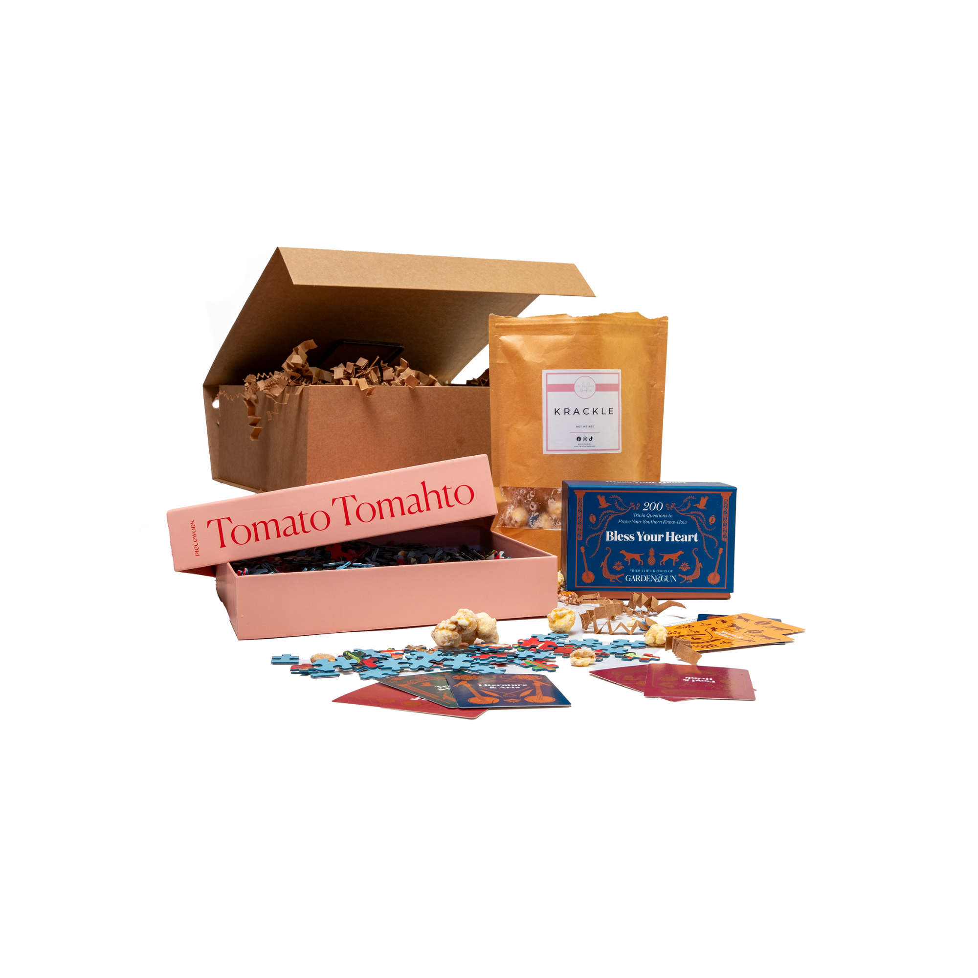 Open gift box with snacks, games and popcorn