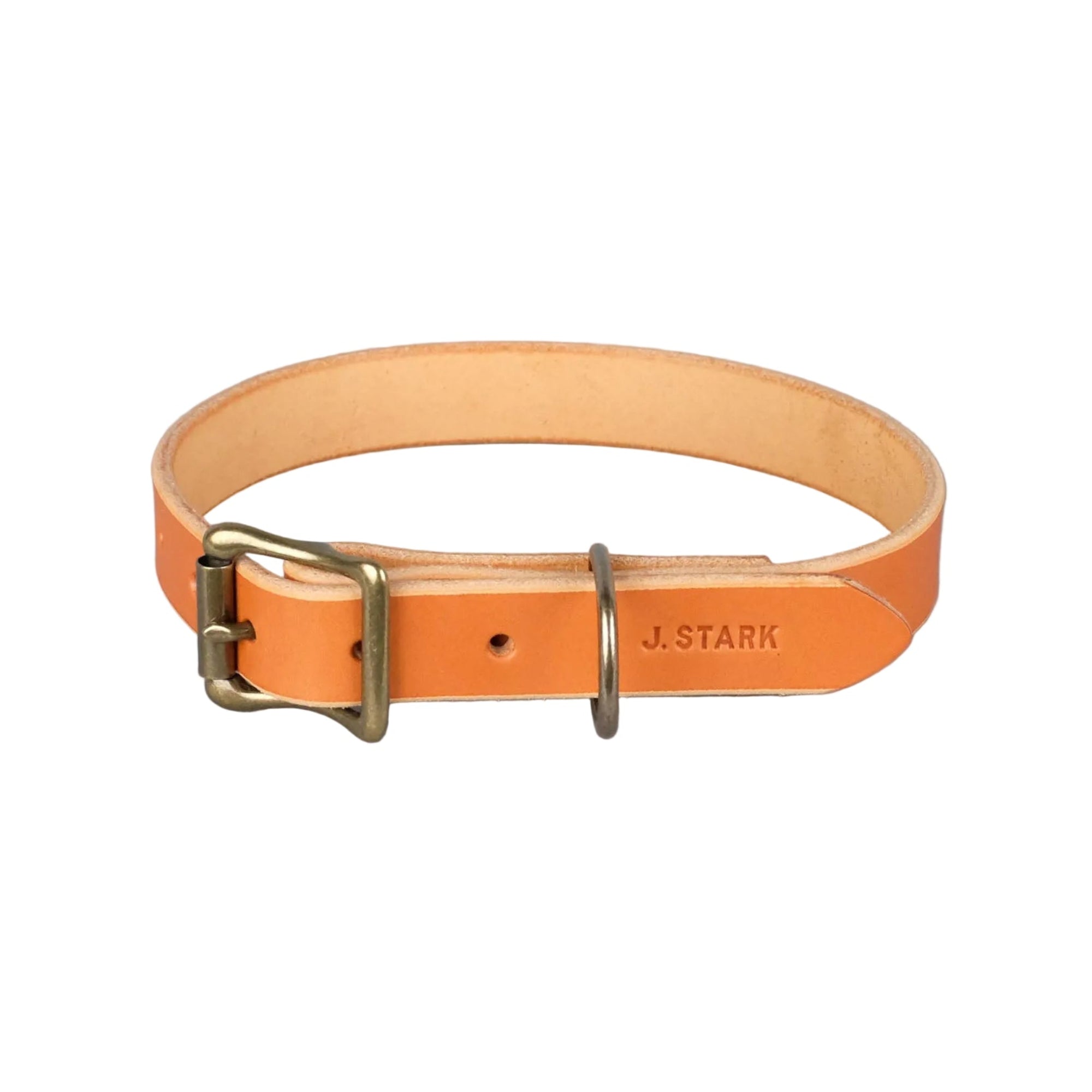 Orange leather dog collar with brass hardware on a gray background