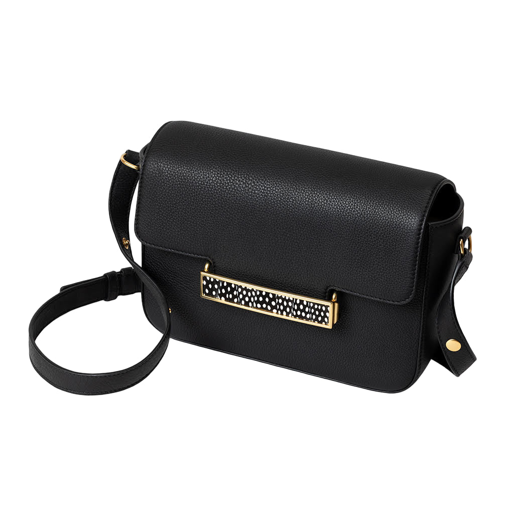 Black handbag with decorative clasp on a white background