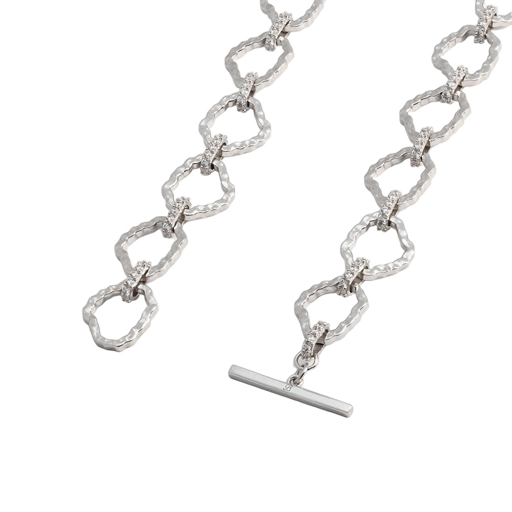 Silver chain necklace with a clasp on a white background