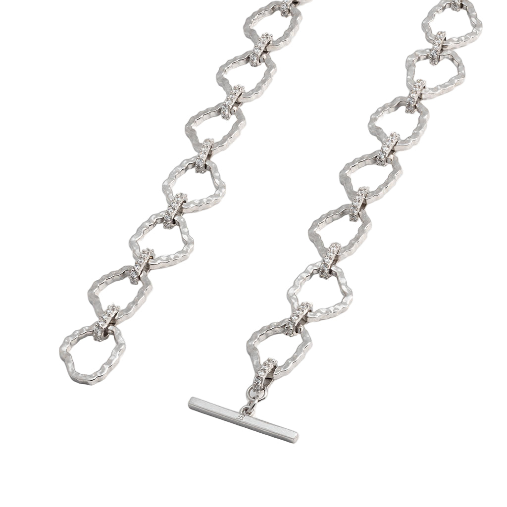 Silver chain necklace with a clasp on a white background