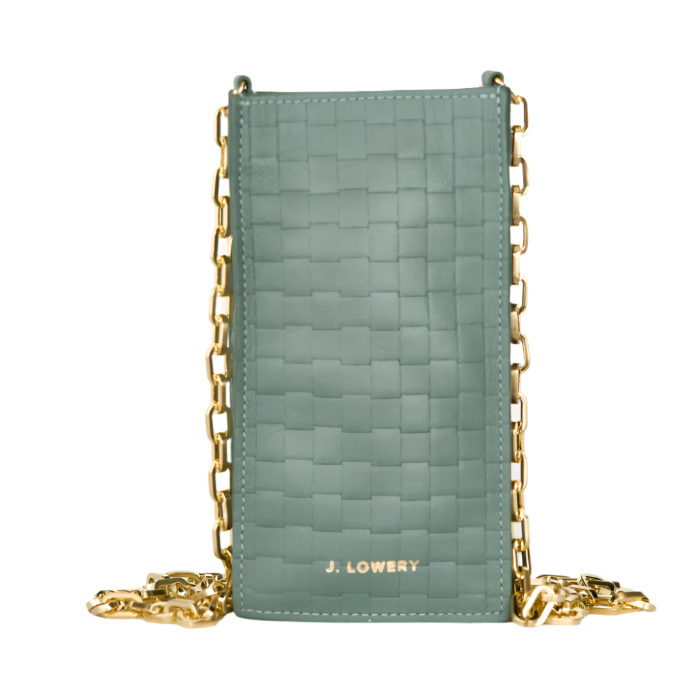 A green woven leather phone pouch with a gold chain crossbody strap and the brand name 'J. Lowery' visible on the front.