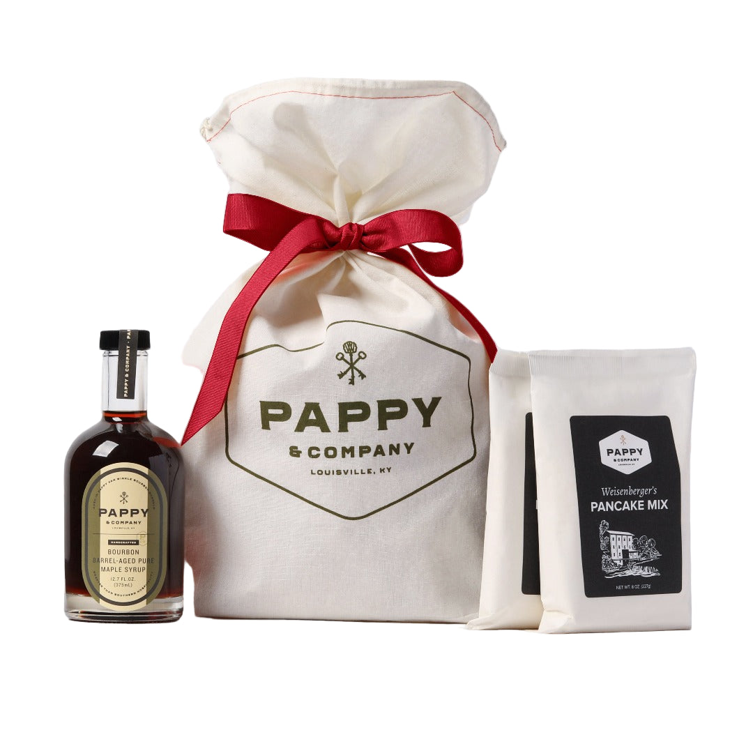 Pappy & Company product set with a bottle, bag, and pancake mix on a white background