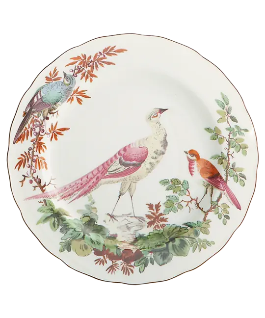 Decorative plate with colorful bird illustrations on a white background