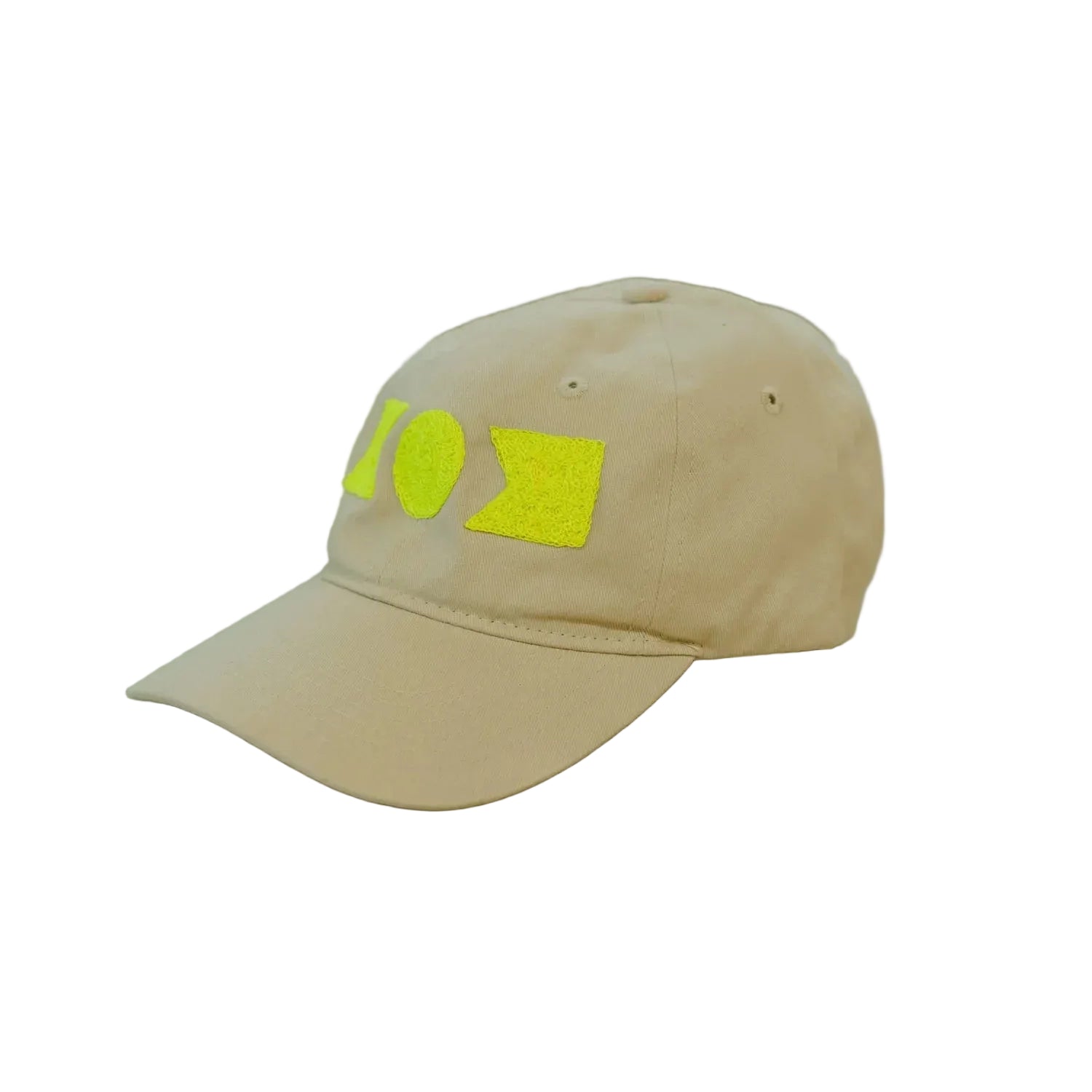 Beige cap with yellow text on a metallic surface