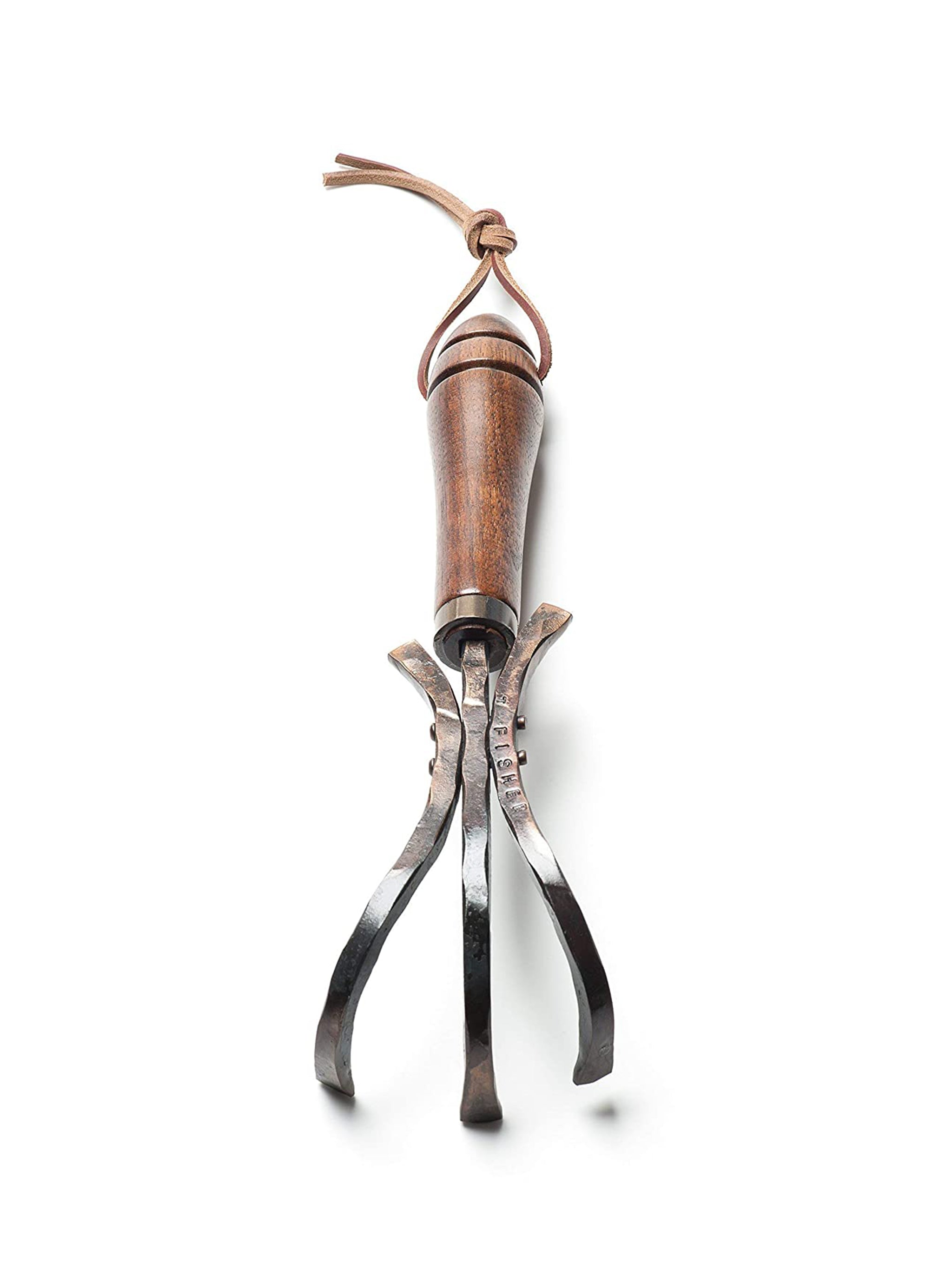 Metal tool with wooden handle on a white background