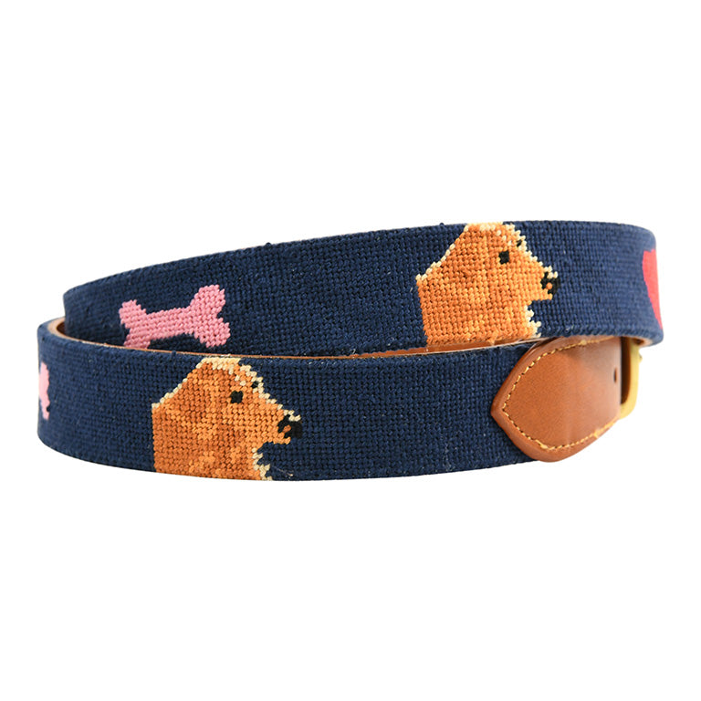 Navy belt with bear and bone pattern on a white background