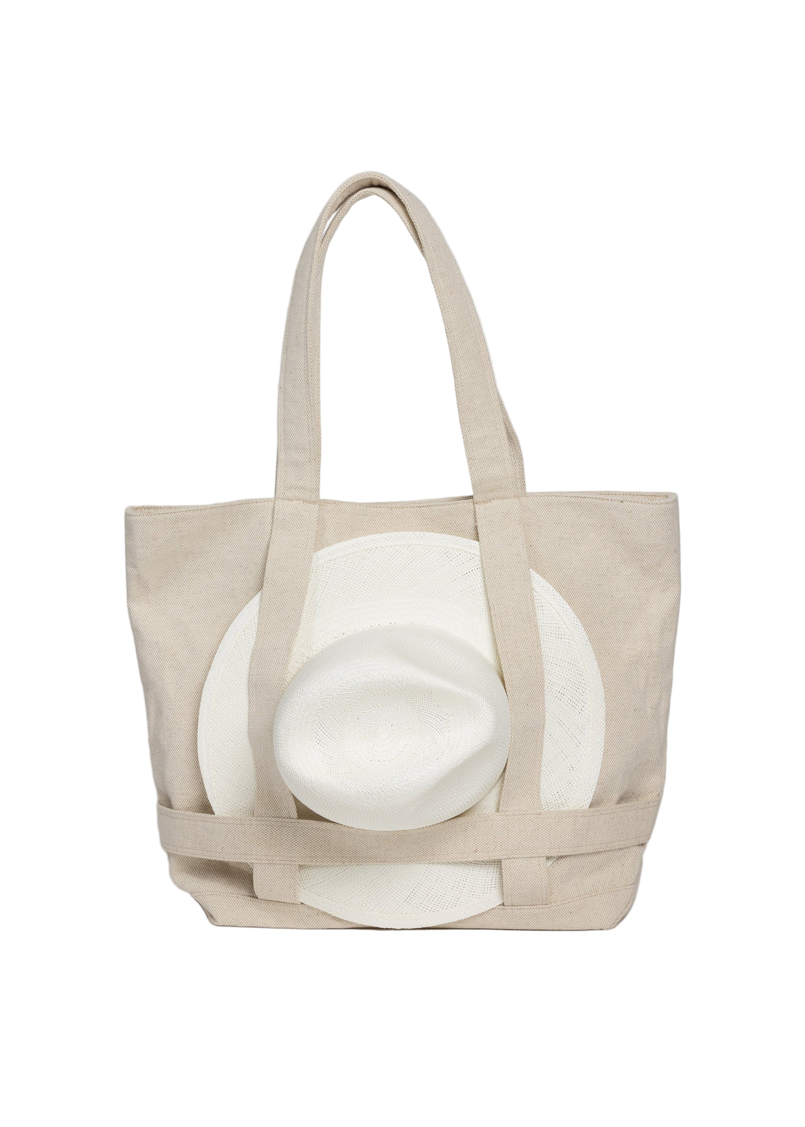 Beige tote bag with white abstract design on a light gray background