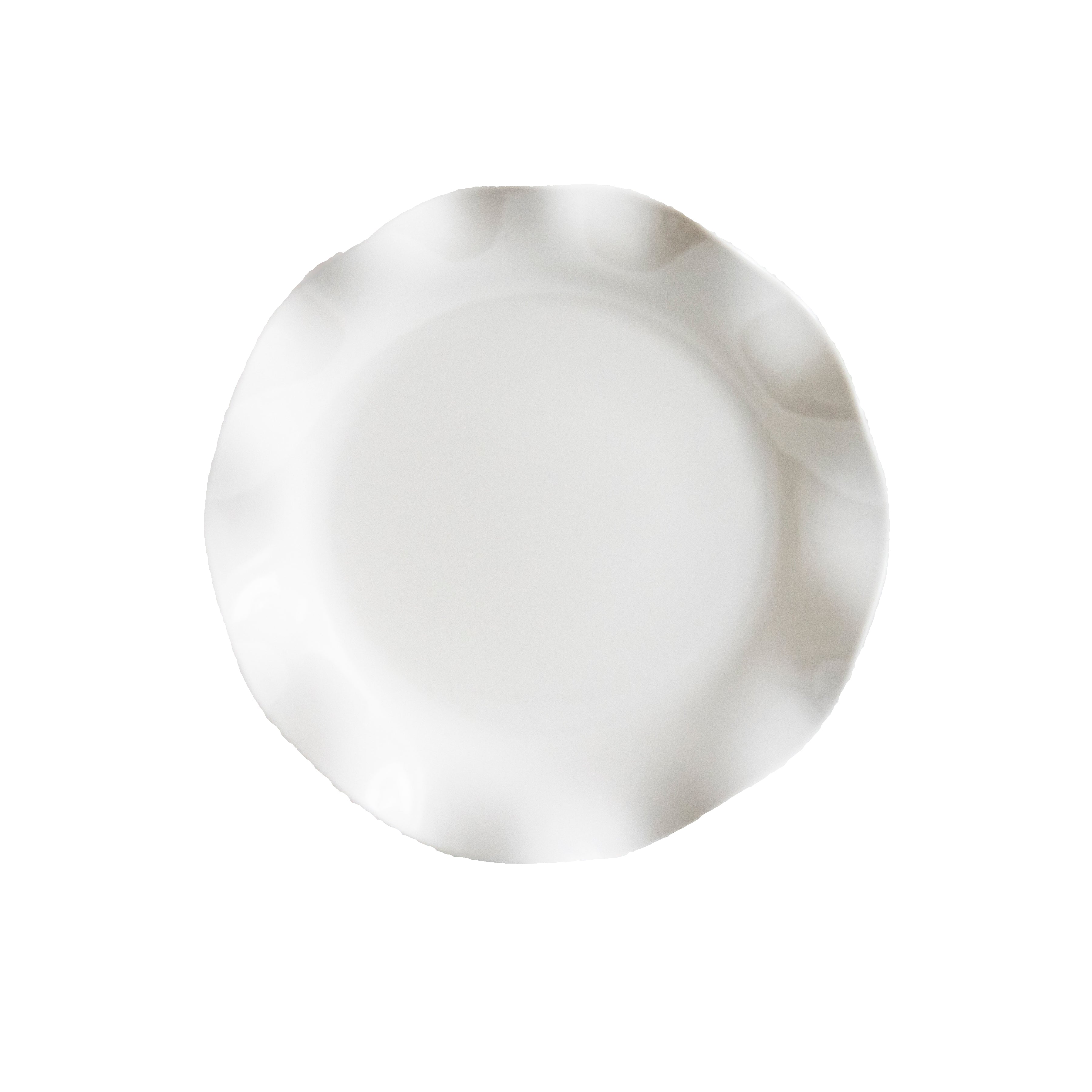White ceramic plate on a light gray background