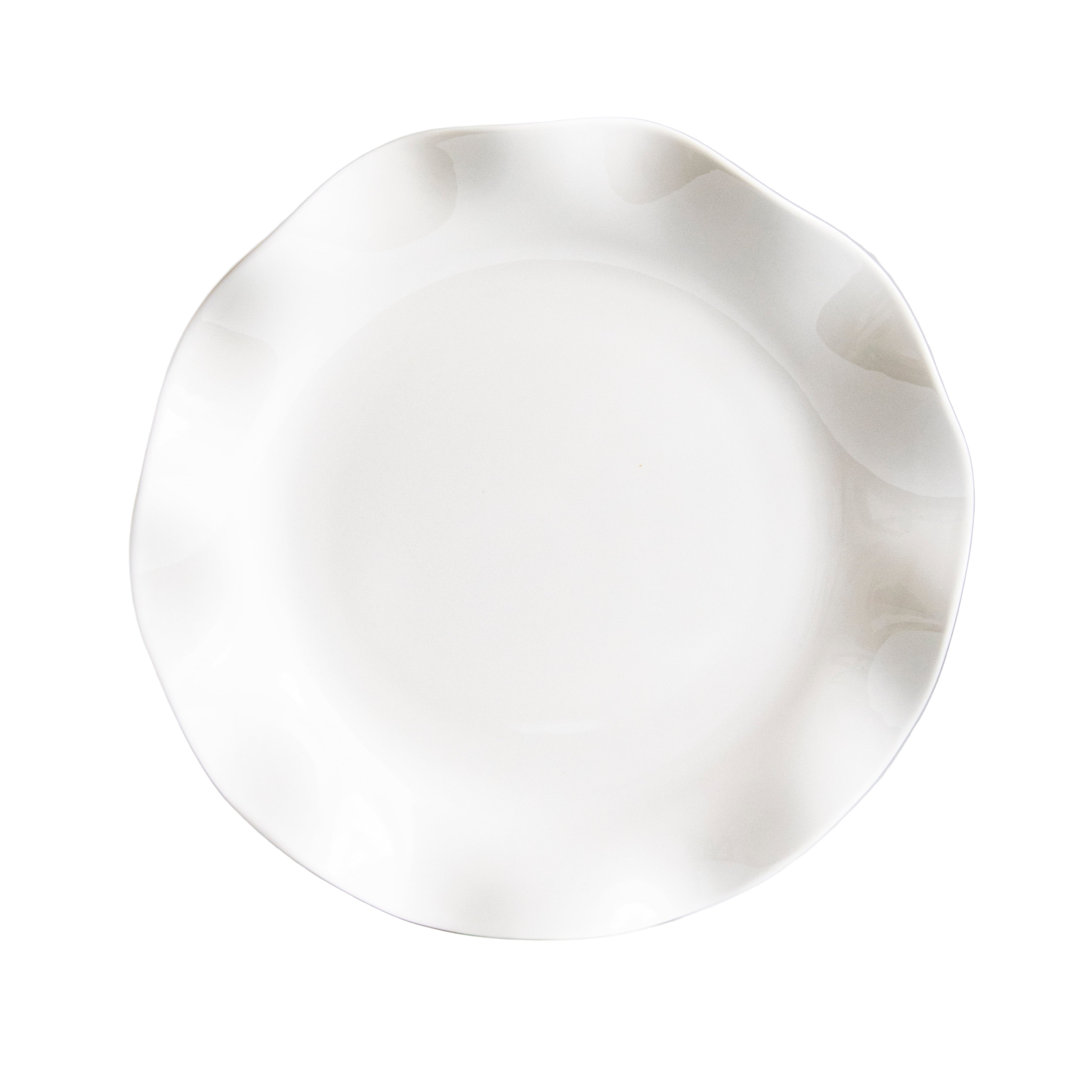 White ceramic plate on a light gray background