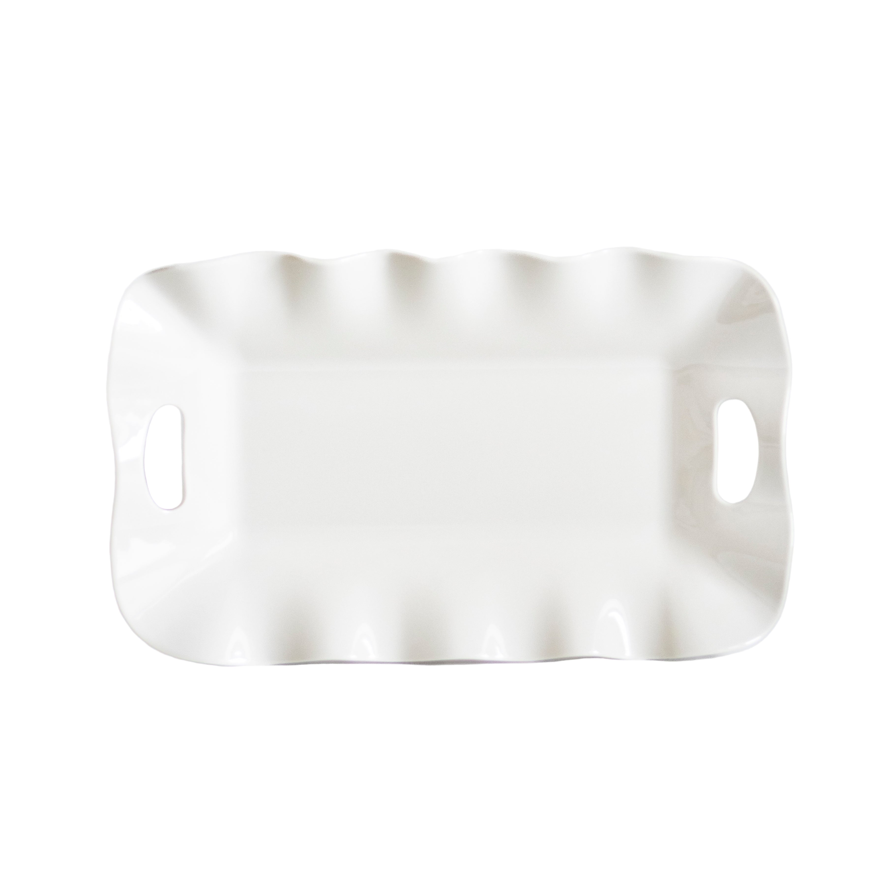 White ceramic tray with handles on a white background