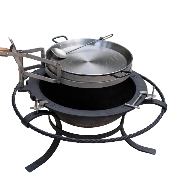 Outdoor cooking setup with metal pans on a fire pit