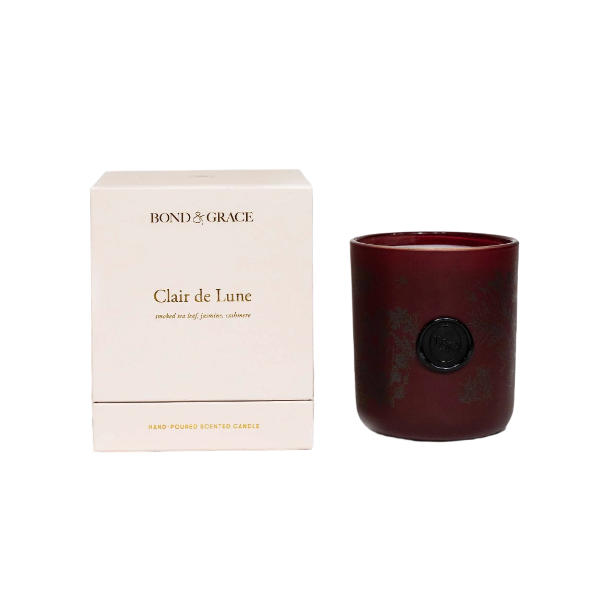 Burgundy candle with 'Bond & Grace' packaging on a white background