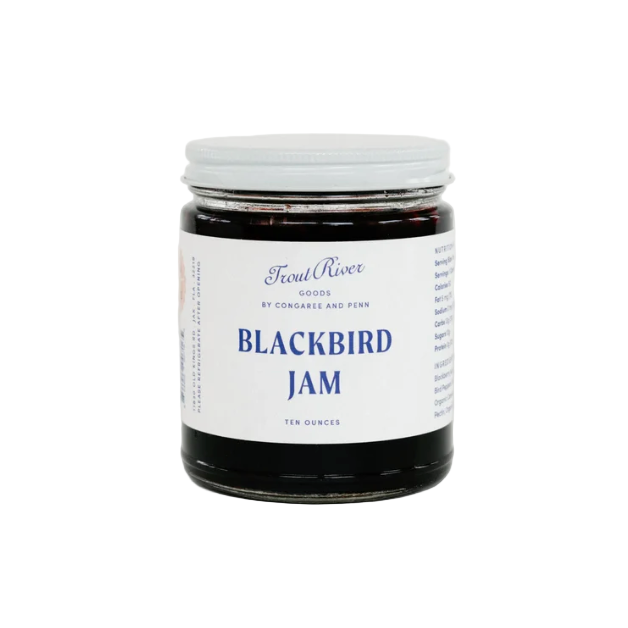 Jar of Blackbird Jam with a white label on a light gray background