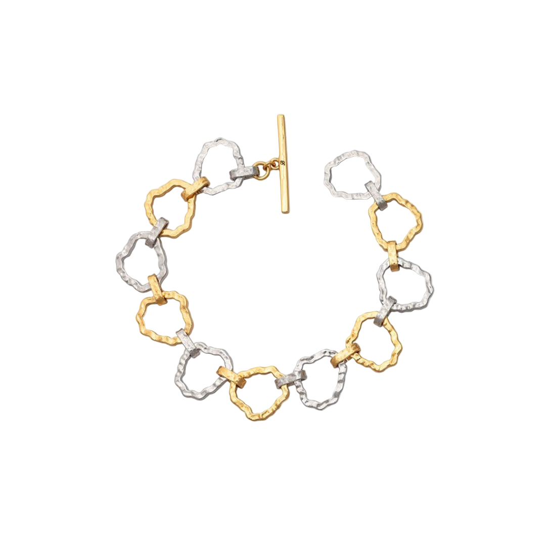 Bracelet with gold and silver links on a white background