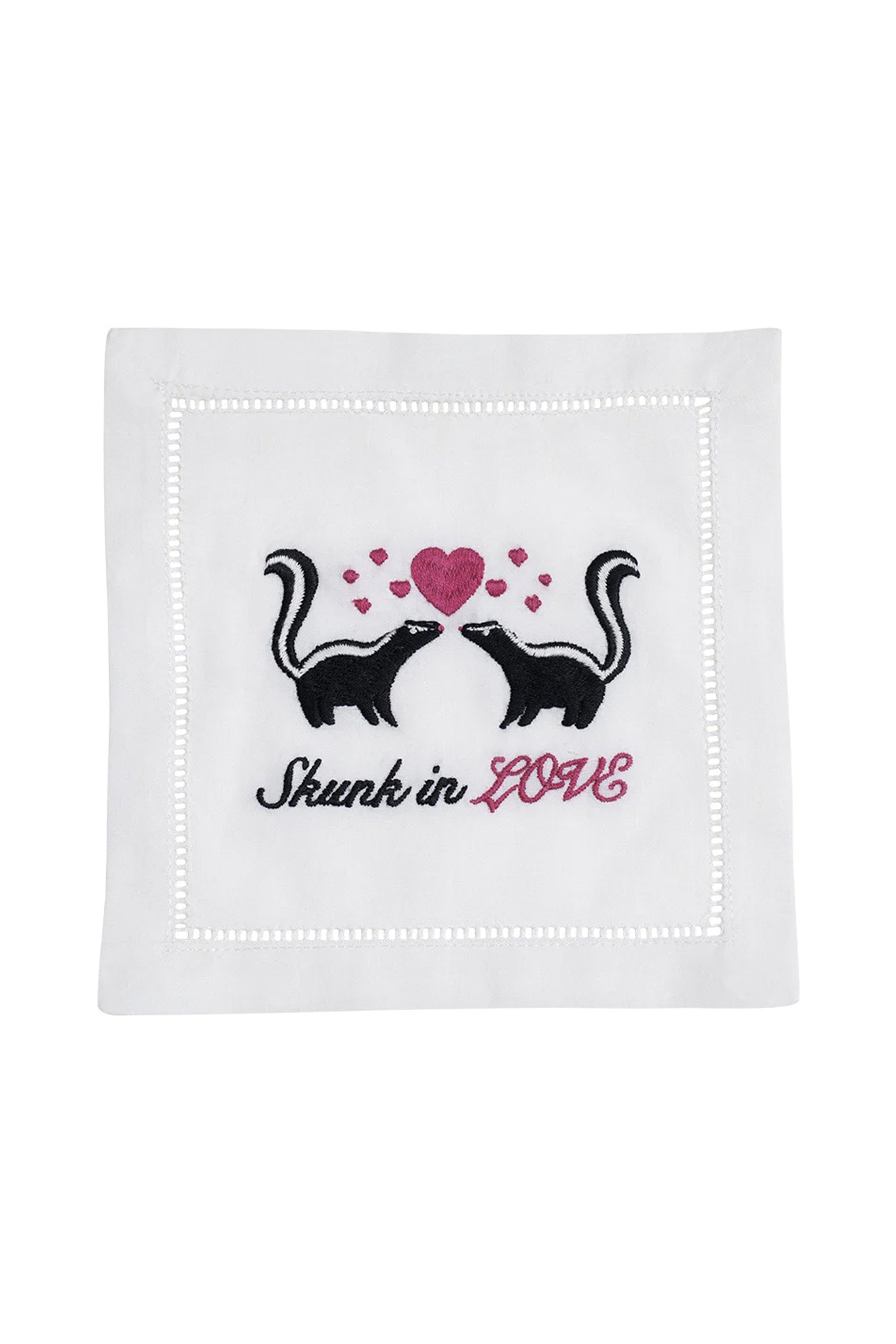 White napkin with black skunk illustration and 'Shunk in Love' text on a white background