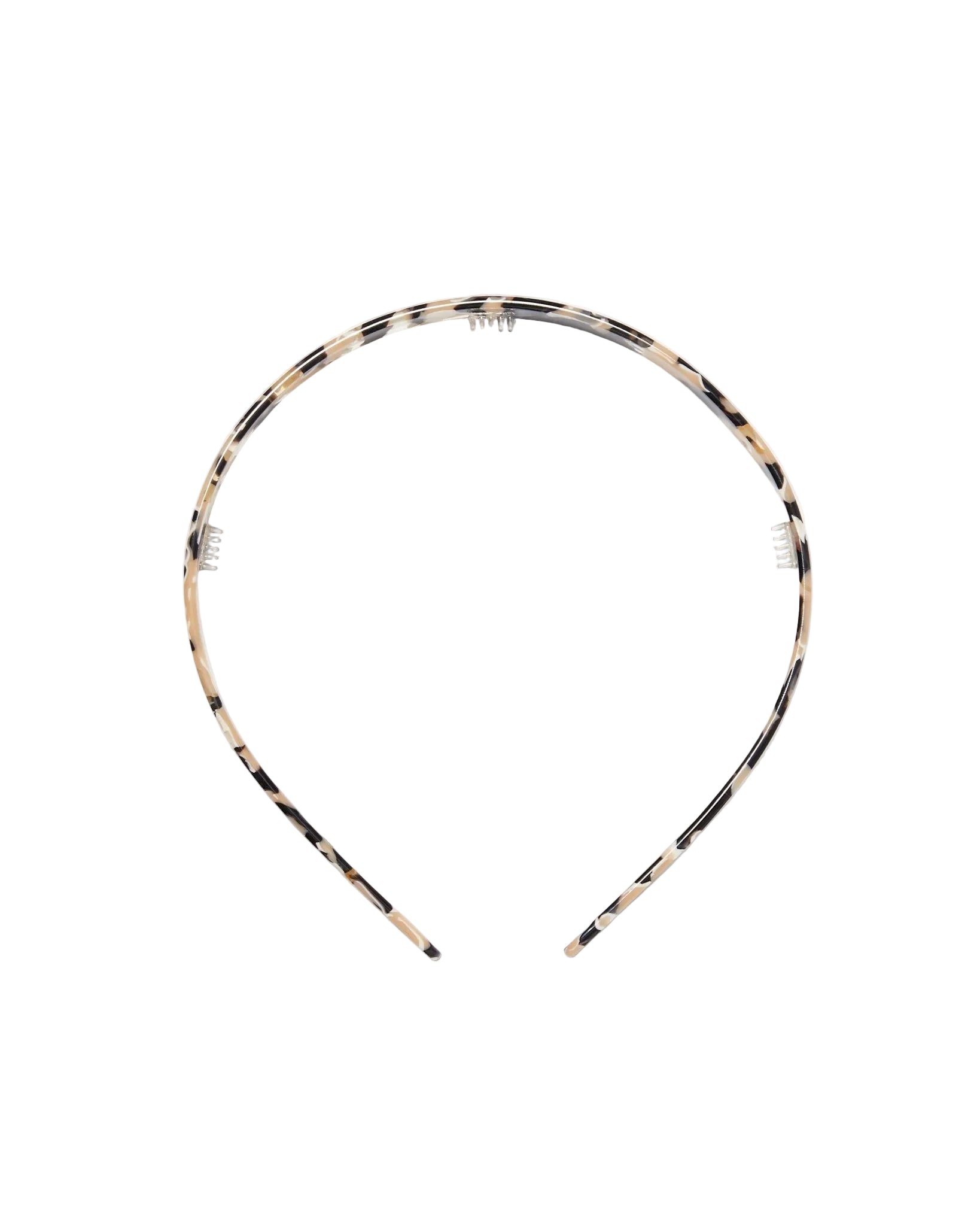 Tortoiseshell patterned headband on a white background